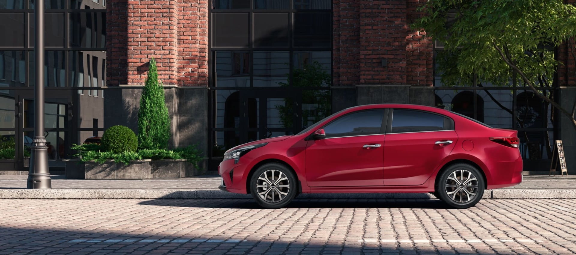 /img/cars/1637051763-exterior_kia_Rio_New_1.jpeg
